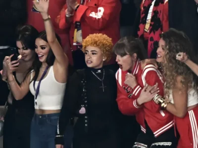 Ice Spice and Taylor Swift with friends at 2024 Super Bowl